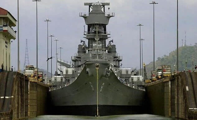 A Battleship Barely Passing Through the Panama Canal