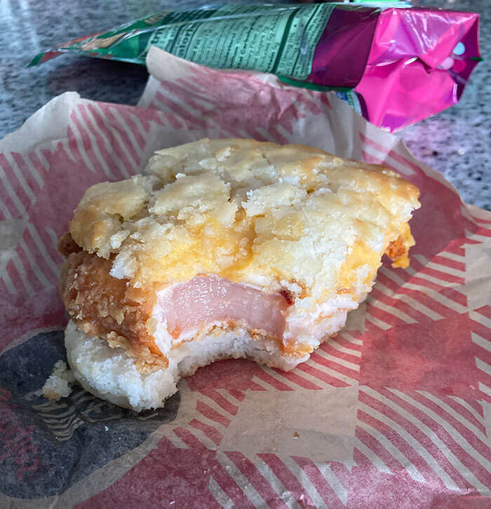 Taking a Bite of Raw Chicken