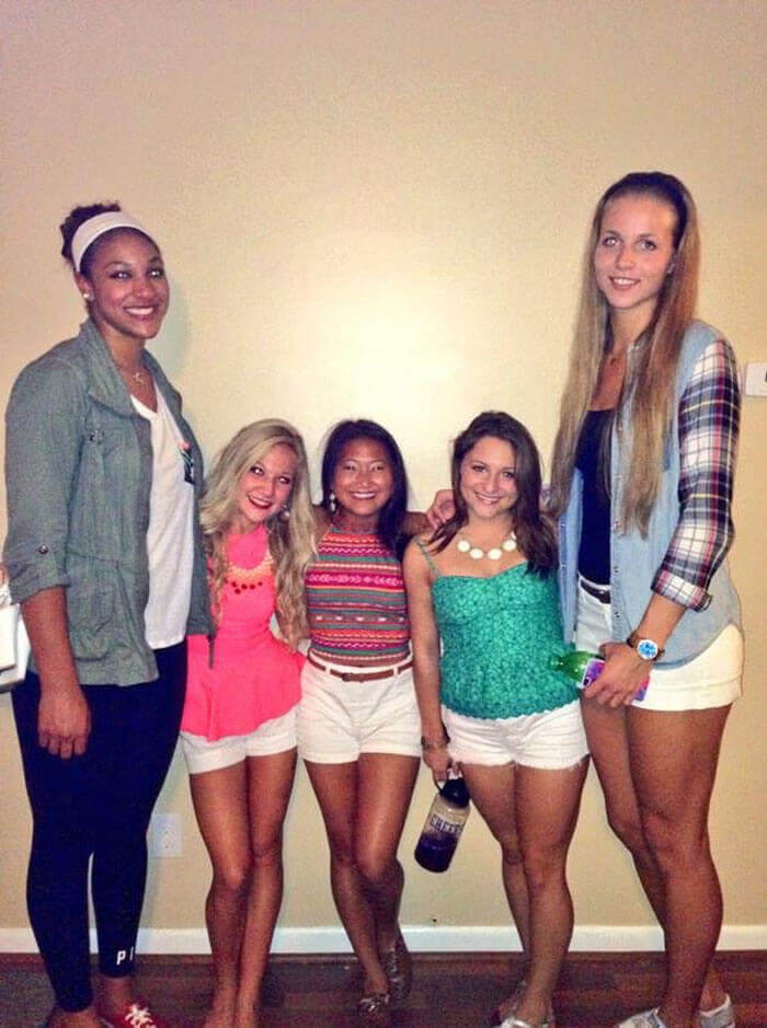 Female Basketball Players Seriously Tower Over Their Cheerleaders