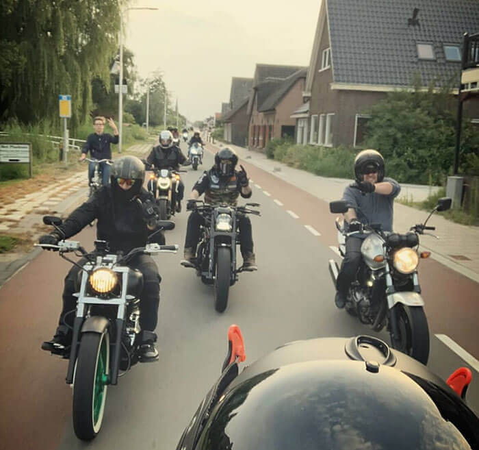 This Random Guy Who Photobombed This Biker Group's Photo